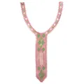 Detail of pink and green embroidered lace collar patch with geometric patterns. - Rose Pink