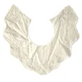 Macro view of white cotton detachable collar with floral hollow embroidery detail - Apricot