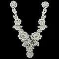 Detailed macro view of white water-soluble lace embroidery floral fake collar piece - White