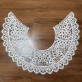 Detailed close-up of white hollow embroidered milk silk lace doll collar decoration - White
