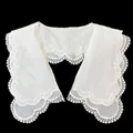 Close-up detail of white double-layered lace doll collar with scalloped embroidery - White