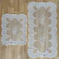 Detail view of two white floral cotton lace embroidered tablecloths on wooden surface - 42*34CM / White