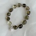 Close-up of handmade S925 silver bracelet with natural smoky crystal beads and heart charm - Heart Pendant Style (B6134) / S925 Sterling Silver / Brown