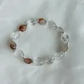 Detailed view of handmade s925 silver bracelet with natural rutilated quartz beads - Oval Clasp Style (B6136) / S925 Sterling Silver / Transparent Tea
