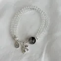 Detalle de la pulsera de cristal natural de plata S925 con dije de perro globo tierno. - Gris Plata
