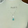 S925 silver necklace featuring a blue crystal teardrop and mini smiley face pendant. - Smiley Style-Sky Blue (N1435) / 925 Silver