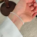 Elegant S925 sterling silver minimalist chain bracelet for women worn on a slim wrist - Twisted Rope Braided Chain Style (B6143) / Silver