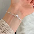 Minimalist S925 sterling silver chain bracelet featuring a delicate carved flower charm - Radiant Pattern Flower Pendant Style (B6144) / Silver
