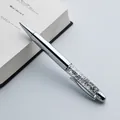 Elegant silver metal ballpoint pen with sparkling crystal glitter barrel for office use - Silver Quicksand Effect