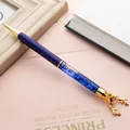 Blue metal quicksand ballpoint pen with a decorative golden reindeer head top - Sapphire Blue