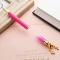 Creative pink reindeer ballpoint pen with sparkling gold quicksand glitter barrel. - Watermelon red