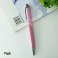 Elegant pink metal ballpoint pen featuring a crystal-filled barrel for gifting - Pink