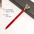 Elegant red metal ballpoint pen featuring a large crystal diamond top for luxury gift sets - Transparent Red