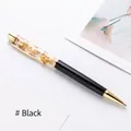 Elegant black metal ballpoint pen with decorative gold foil flakes in clear upper barrel - Black