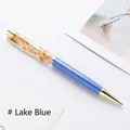 Elegant lake blue metal ballpoint pen featuring floating gold leaf in oil barrel - Lake Blue