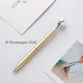Luxurious champagne gold metal ballpoint pen featuring a large glossy pearl top embellishment - Luxury Gold / Bullet Type 1.0 Black Ballpoint Refill