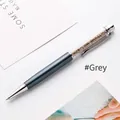 Elegant grey metal ballpoint pen with crystal-filled clear barrel - 1.0mm Bullet Tip Black Ink / Gray