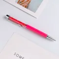 Elegant crystal ballpoint pen in vibrant watermelon red with sparkly diamond grit fill. - Watermelon red
