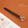 Penna a sfera in metallo nero con un grande diamante di cristallo e finiture argentate. - Black silver parts