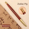 Premium rosewood and brass gel pen featuring a Chinese zodiac pig figurine top design - Dalbergia-Pig