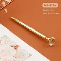 Elegante penna a sfera in metallo dorato con un grande diamante in cristallo in cima - Oro
