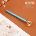 Elegante penna a sfera in metallo azzurro con un grande cristallo di diamante scintillante - Celeste