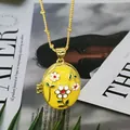 Close-up of yellow enamel oval locket necklace with delicate floral pattern detail - Lemon Yellow - White Flower Red Stamen Style (D3)