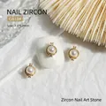 Elegant gold-framed pearl nail charms with zircon accents for luxury nail art designs. - Pearl Photo Frame Style (G618)