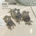 Exquisite silver star tassel nail charms with sparkling rhinestones for luxury nail art - 27.7x12.6mm (1 Piece/Pack)