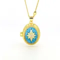 Close-up of a blue enamel oval locket pendant necklace with an eight-pointed star - Light Blue Base Rhinestone Star Locket (AC133)