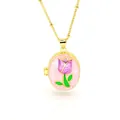 Close-up of golden oval photo locket necklace with purple tulip enamel detail - Light Pink Texture - Purple Tulip Style (C2)