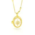 Close-up view of gold oval locket necklace featuring a sparkling North Star motif - White Enamel Marble Star Locket (AC133)