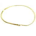 Detailed macro shot of an elegant 18k gold plated flat snake bone chain necklace design - Snake Chain (Style 21)