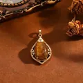 Vintage-Anhänger aus Kupfer mit einem ovalen braunen Katzenaugenstein in Gold. - Gold Brauner Augenstein (Anhänger Ohne Kette)