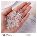Aurora iridescent transparent resin bow nail art charms, 50pcs pack for manicures. - 50 Pieces/Pack (9*6.2mm)