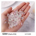 Aurora iridescent resin bow nail art charms for DIY manicures, pack of 50 pieces - 50 Pieces/Pack (8.6*5.6mm)