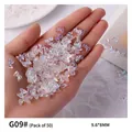 Aurora ice translucent resin bow-knot nail art charms variant G09 in pack of 50 pieces - 50 Pieces/Pack (9.6*8mm)