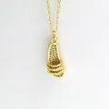 Close-up of gold-plated slide sandal pendant necklace with sparkling rhinestones - Three-Bar Sport Slide Style (aa8)