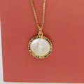 Detail view of Virgin Mary shell pendant necklace with colorful rainbow cubic zirconia - Virgin Mary Rainbow Zirconia (a10)
