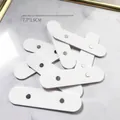 High-quality detail view of white acrylic magnetic strips for nail art display 7.7x1.9cm - Display Magnetic Strips / 10 Pieces Pack / White
