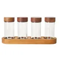 Japanese 4-piece glass spice jar set with acacia wood lids and wooden storage base. - 4-Piece Set with Wooden Rack