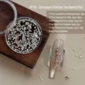 DIY champagne zirconia nail art kit for Christmas tree design featuring multiple gem shapes. - Champagne Material Package
