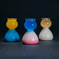 Primo piano di bicchierini da shot colorati a forma di zucca con sfumature vivaci - 101-200ml / Apertura 3,5 cm altezza 9,5 cm