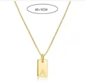 Detail of gold stainless steel necklace featuring engraved initial A on a square pendant - Square Letter A / 45cm (40+5cm)