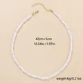 Elegant white faux pearl necklace with clear faceted beads and gold-tone chain extender - Artificial Pearl Necklace (XL0191_2)
