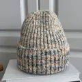 Close-up detail showcasing the soft texture of a multi-color mixed knit warm winter beanie hat - M (56-59cm) / Mixed Beige