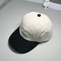 Detailed view showcasing the high-quality corduroy texture of this two-tone baseball cap. - M (56-58cm) / Black and Beige Colorblock
