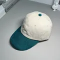 Detail of a two-tone corduroy baseball cap with cream crown and teal brim texture - M (56-58cm) / Peacock Blue and Beige Colorblock