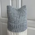 Detailed view of the grey knitted beanie with cute cat ears and fuzzy texture - M (56-58cm) / Light Gray