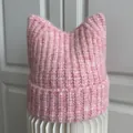 Close-up detail of a soft pink knitted cat ear beanie showing thick warm wool texture - M (56-58cm) / Pink